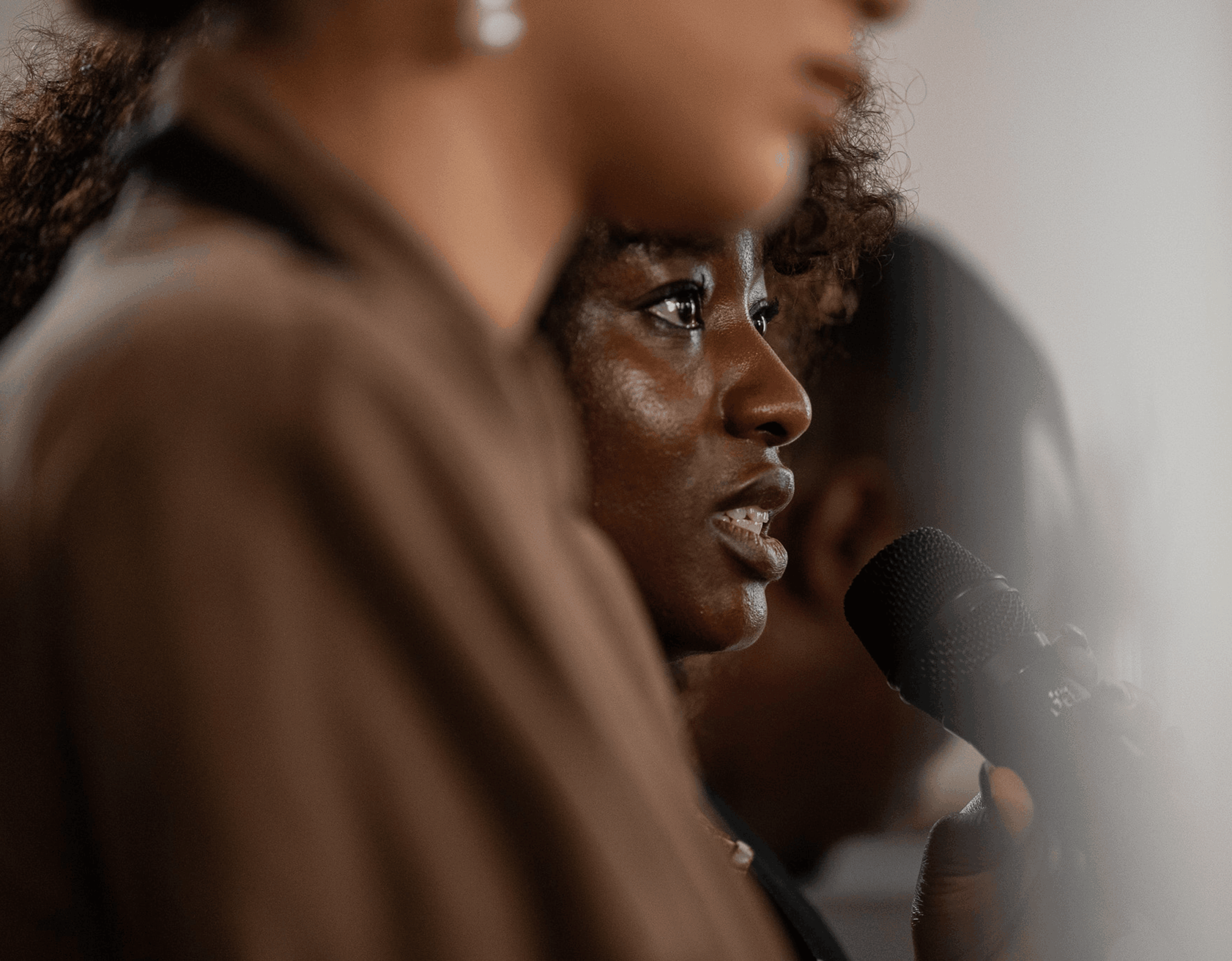Participants listen during an AGE Summit session.